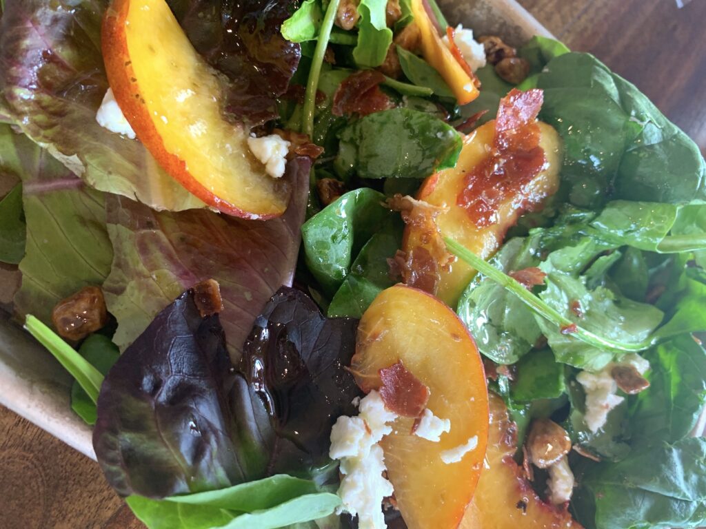 Seasonal peach salad offered at Torr Na Lochs Winery in Burnet, Texas